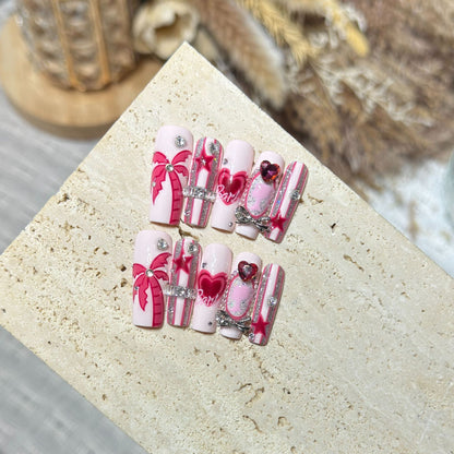 Artistic Press-On Nail Set with Playful Heart and Palm Designs Acalora