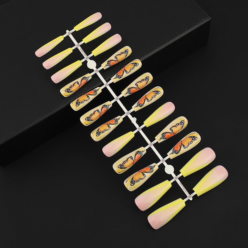 Art nails with butterfly motif Acalora
