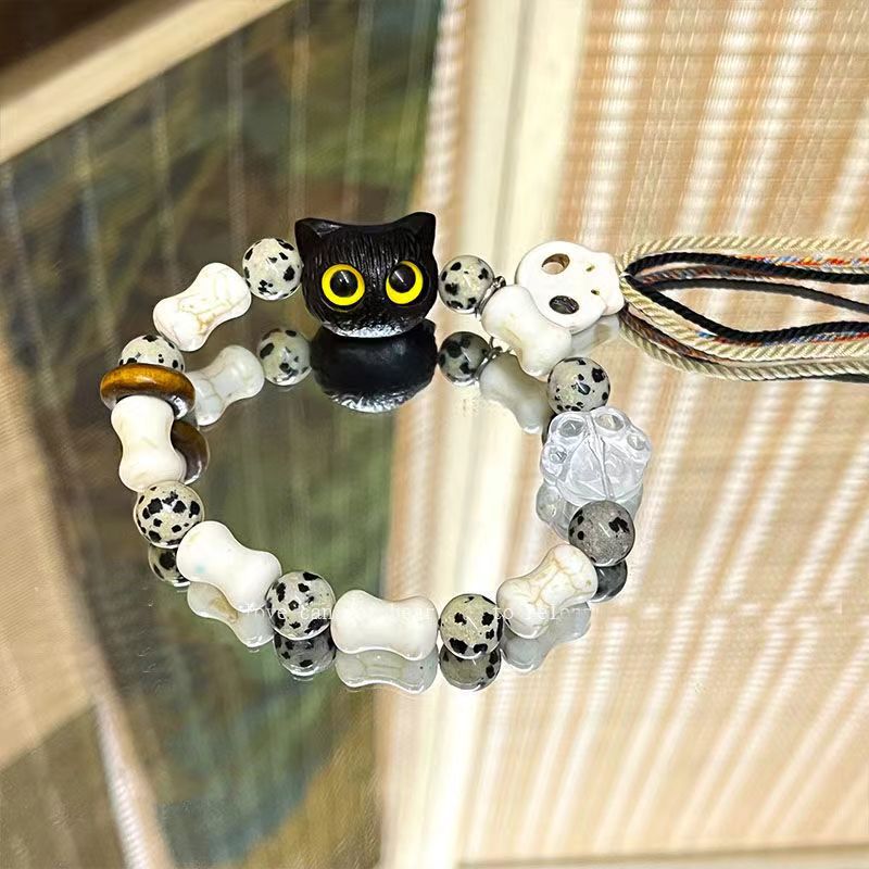 Whimsical Cat and Bone Charm Bracelet Acalora