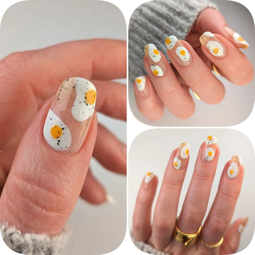 Artificial nails in creative fried egg design Acalora