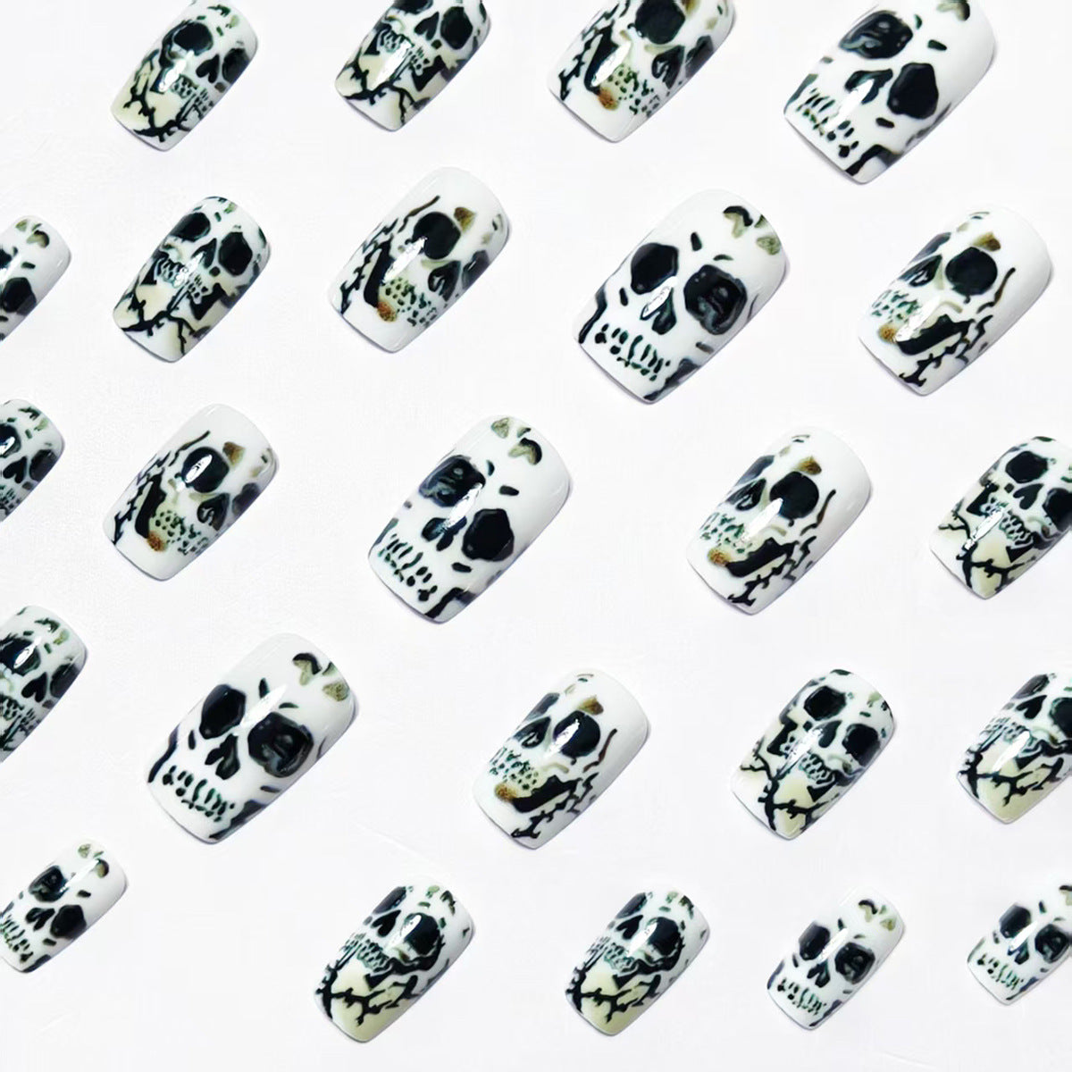 Artistic Skull-Themed Nail Art Acalora