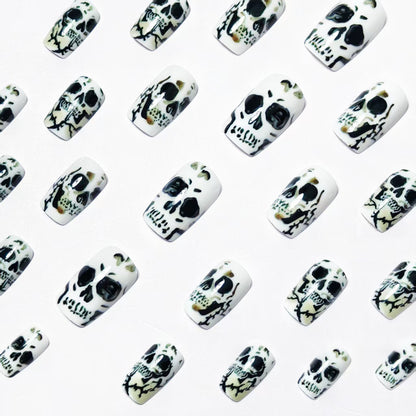 Artistic Skull-Themed Nail Art Acalora