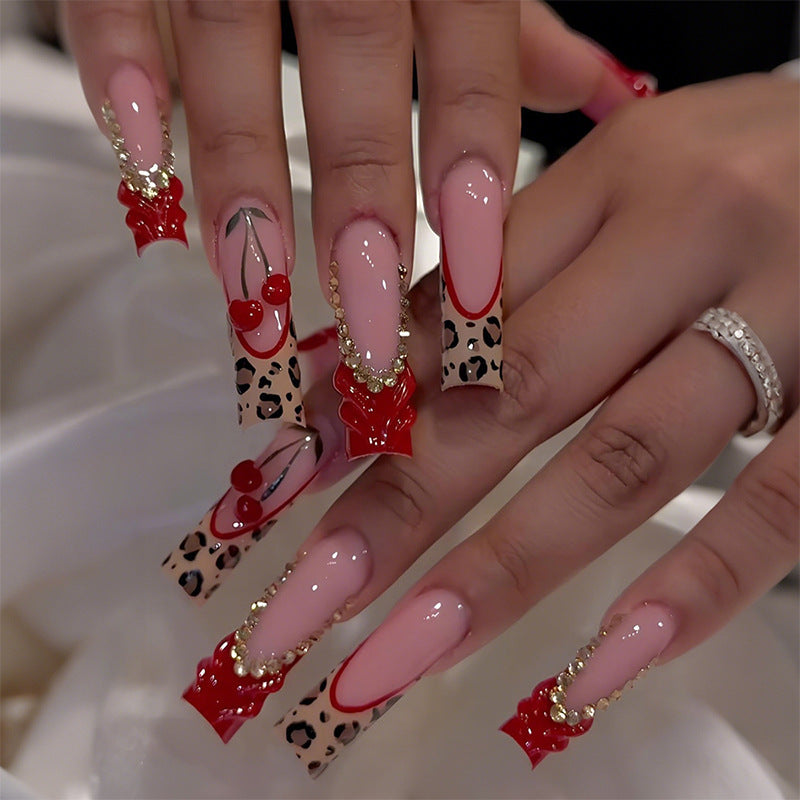 Artistic Long Press-On Nail Extensions with Decorative Accents Acalora