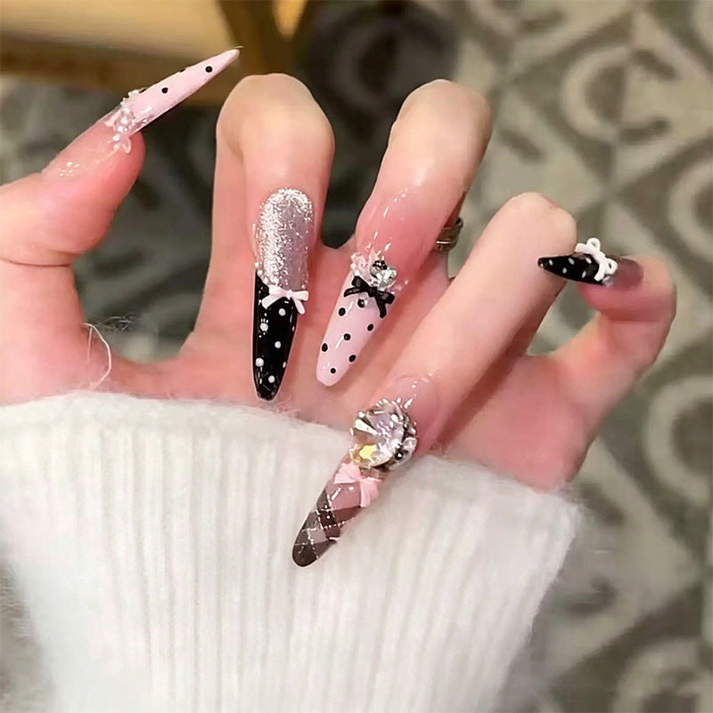 Artificial nail set with glamorous 3D applications and festive design Acalora