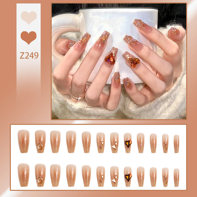 Artificial nail set with glitter and heart accents Acalora