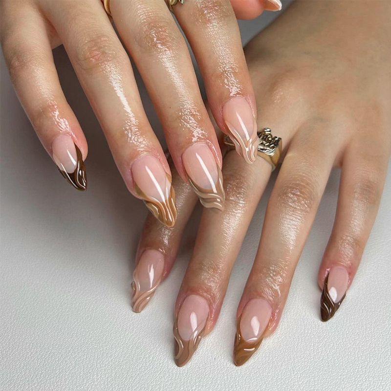 Acrylic nail set with elegant marble pattern and glossy finish Acalora