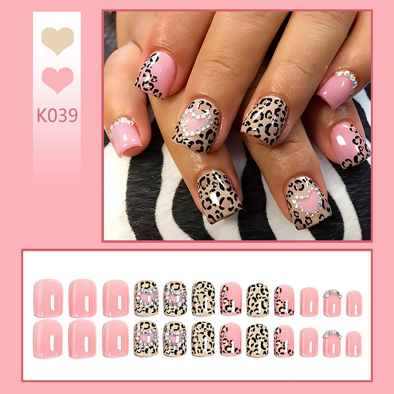 Glamorous artificial nail collection with animal motif and crystal embellishments Acalora