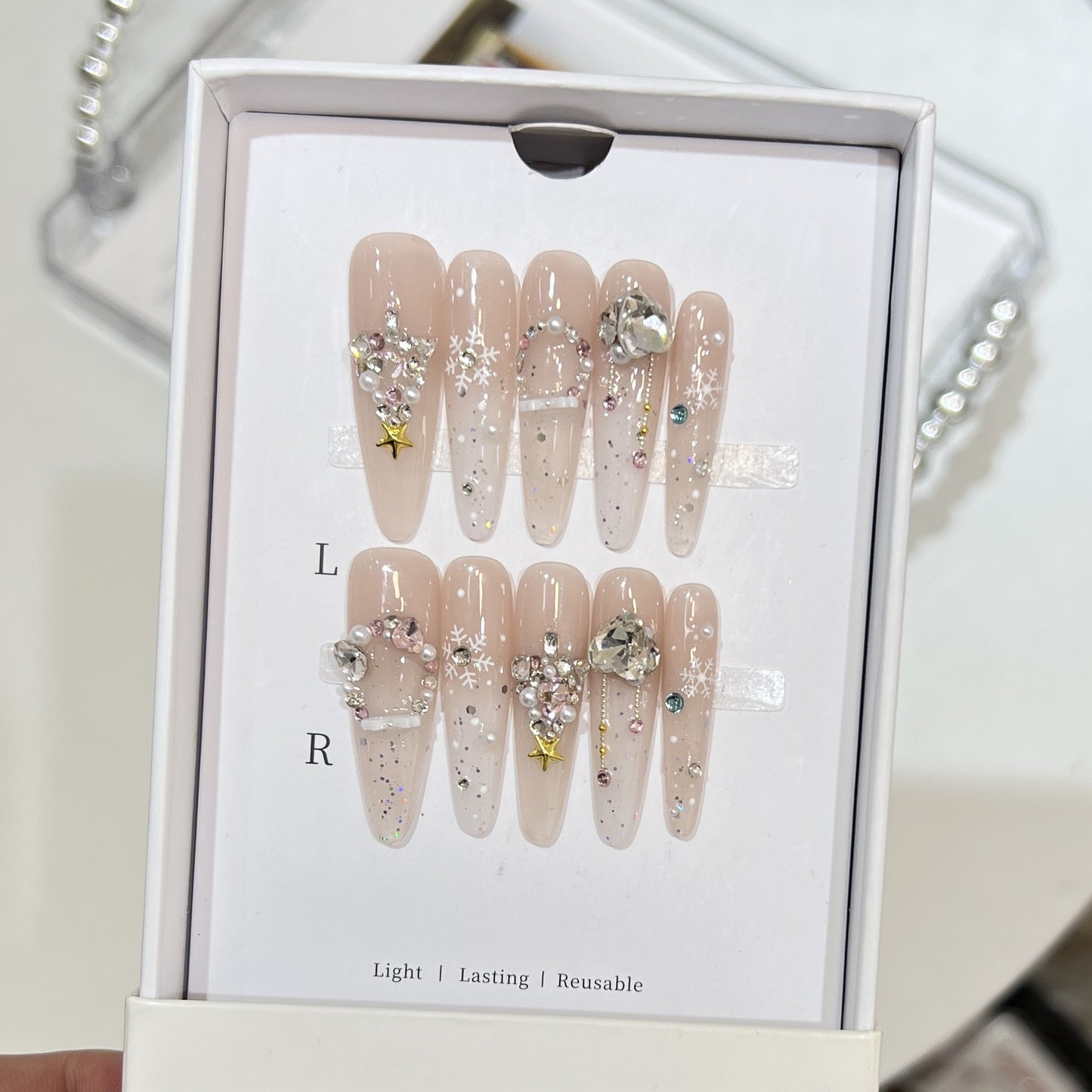 Artistic Press-On Nail Set with Snowflake and Gemstone Designs Acalora