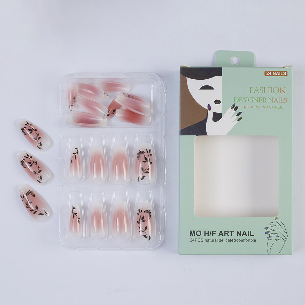 Press-on nails in elegant ombre design with floral accents Acalora
