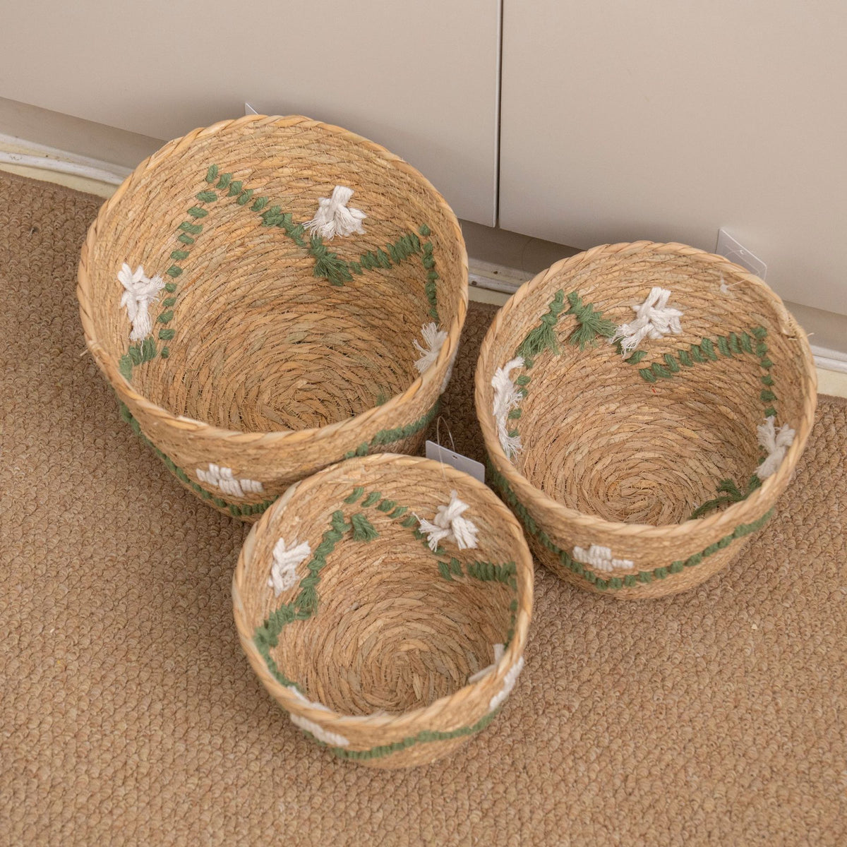 Handwoven storage basket with colorful accents Acalora