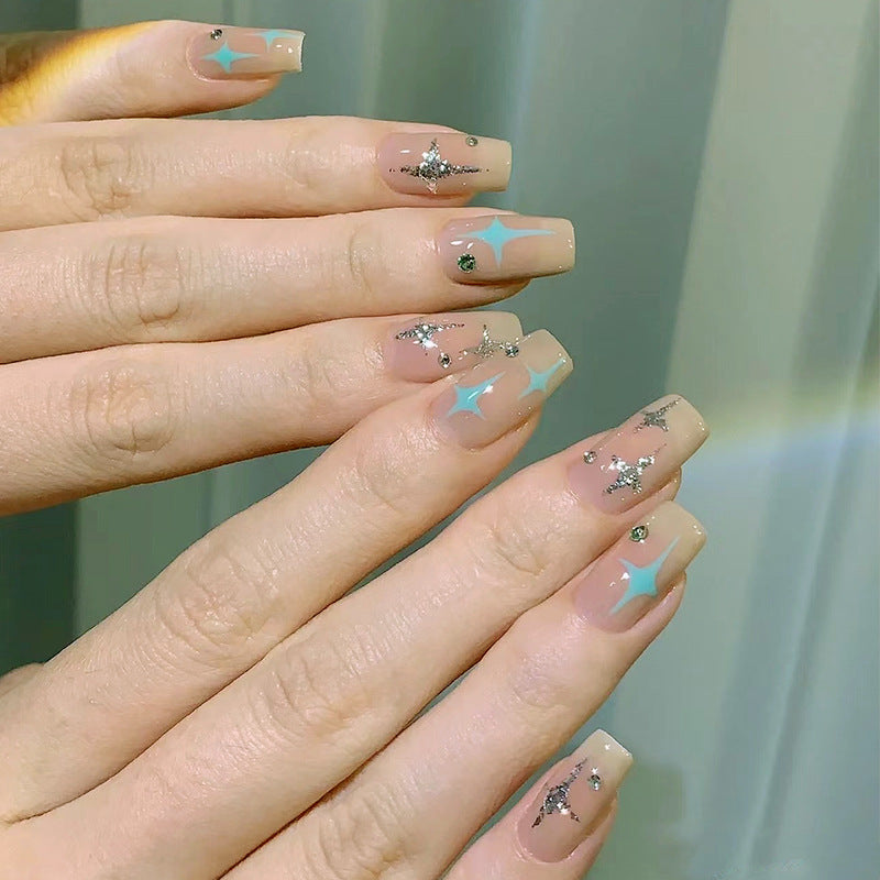 Acrylic nail set with sparkling star and glitter elements Acalora