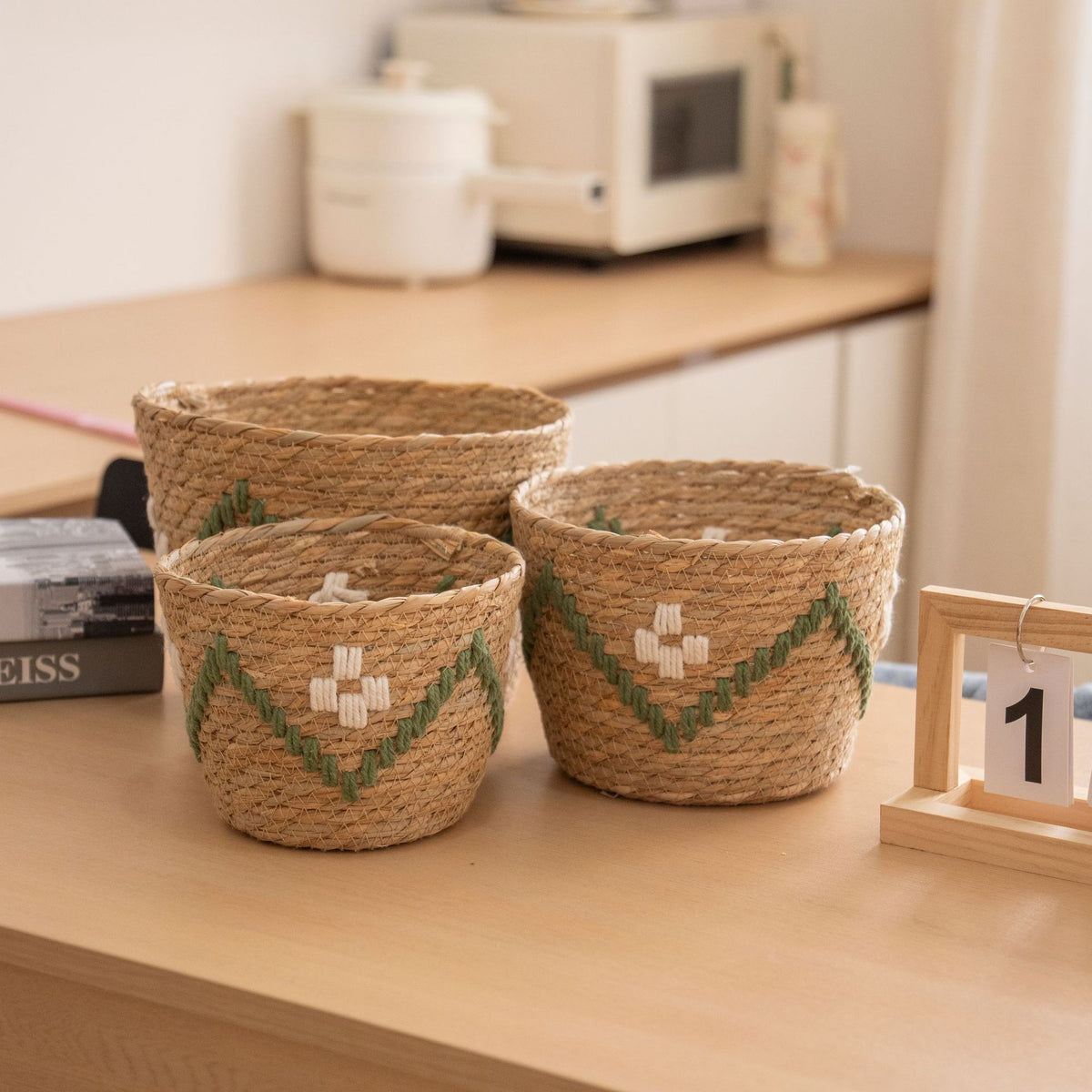 Handwoven storage basket with colorful accents Acalora