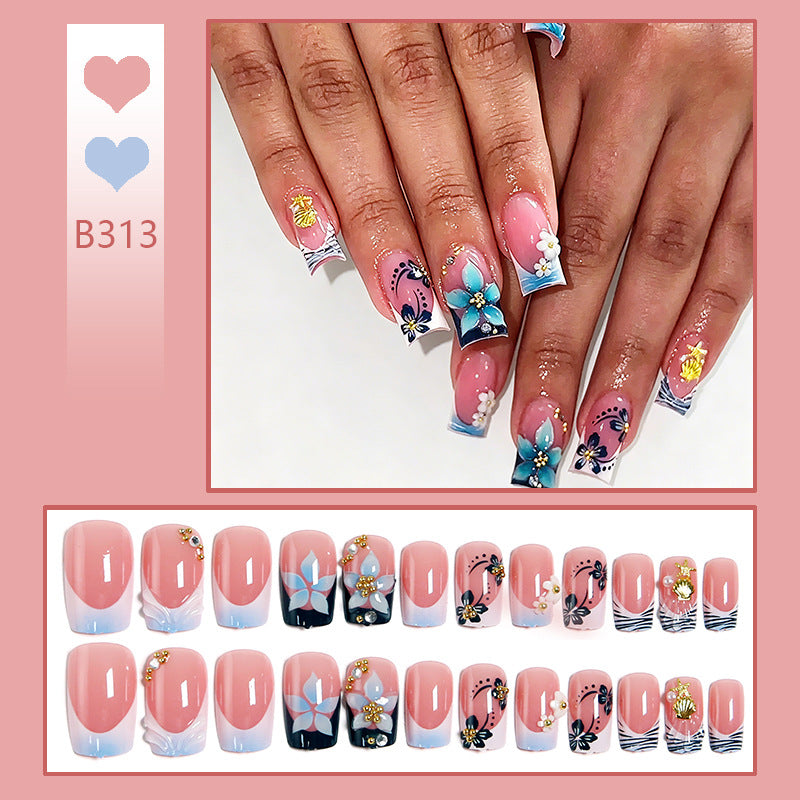Artificial nails in creative floral design with glitter accents Acalora