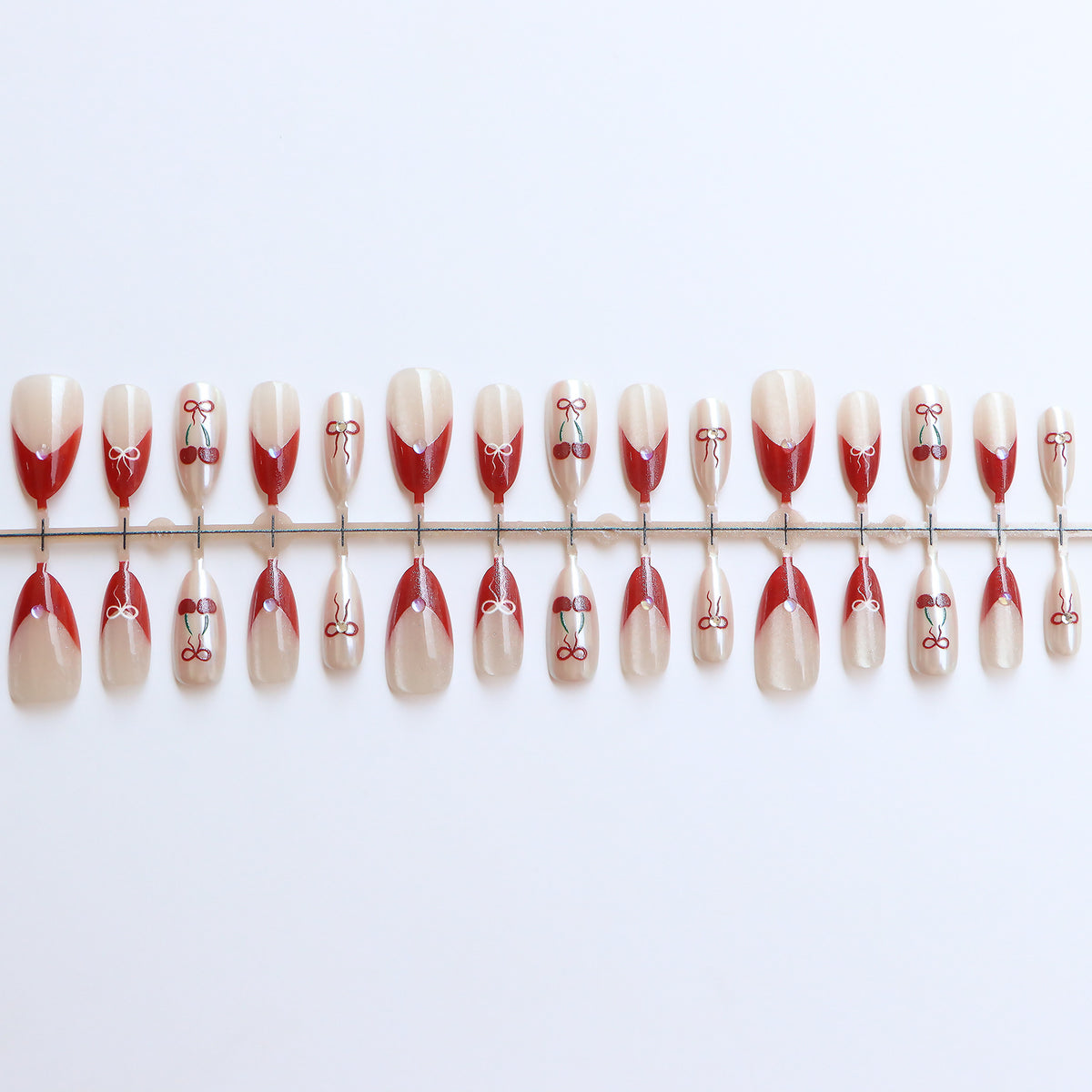 Artistic Press-On Nail Set with Cherry and Ribbon Design Acalora