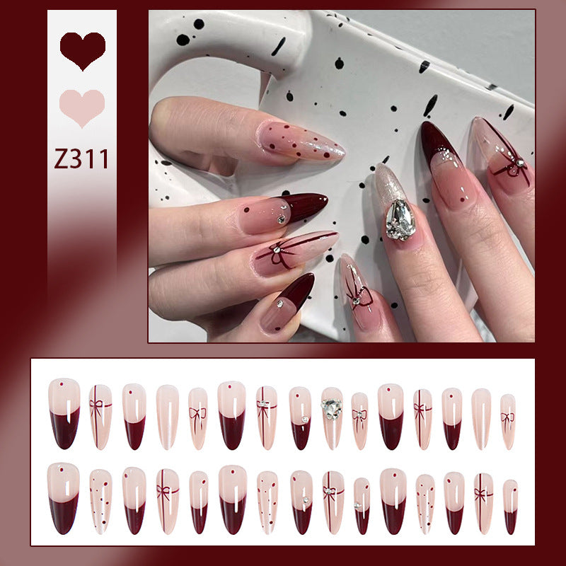 Artificial nail set with elegant bow and glitter details Acalora