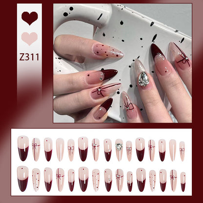 Artificial nail set with elegant bow and glitter details Acalora