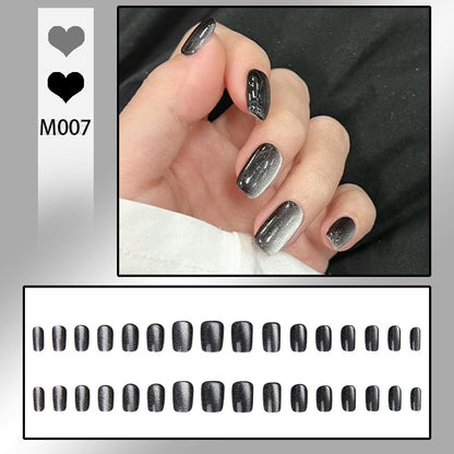 Artifical nail set with glamorous ombre effect and glitter embellishments Acalora