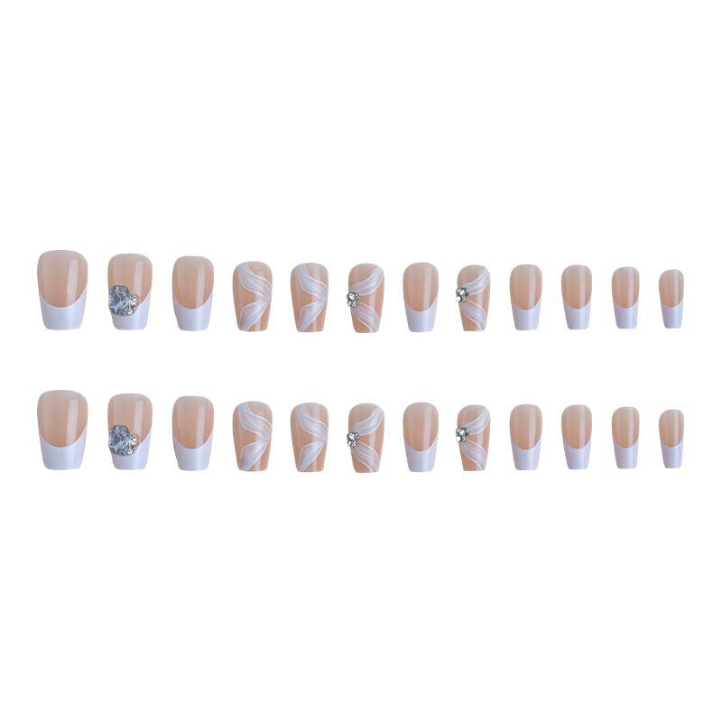 Elegant artificial nail set with delicate decorations and glitter elements Acalora