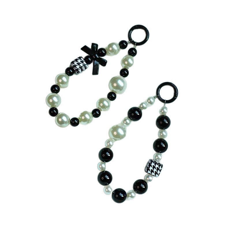Elegant Pearl and Black Bead Charm Bracelet Acalora