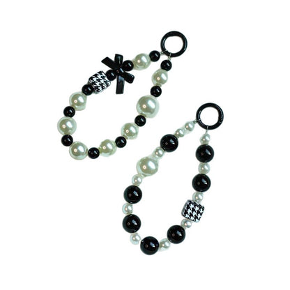 Elegant Pearl and Black Bead Charm Bracelet Acalora