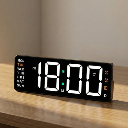 Digital wall clock with temperature and weekday display