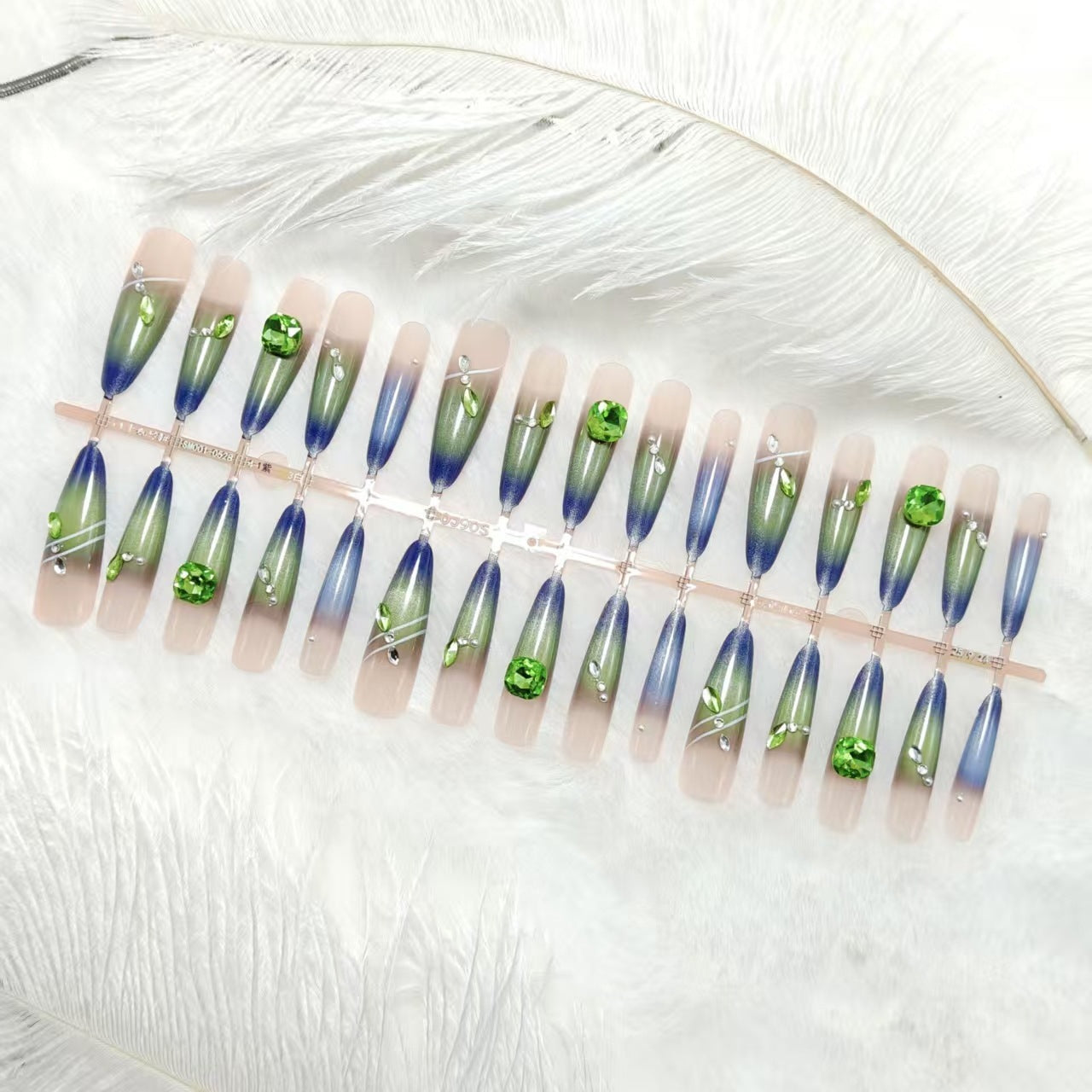 Artificial nails with elegant gradient color and glitter accents Acalora
