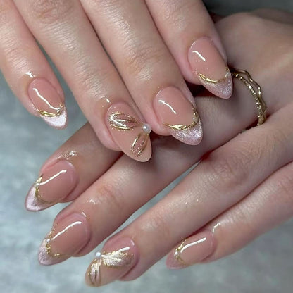 Nail set with glamorous golden accents and elegant design Acalora