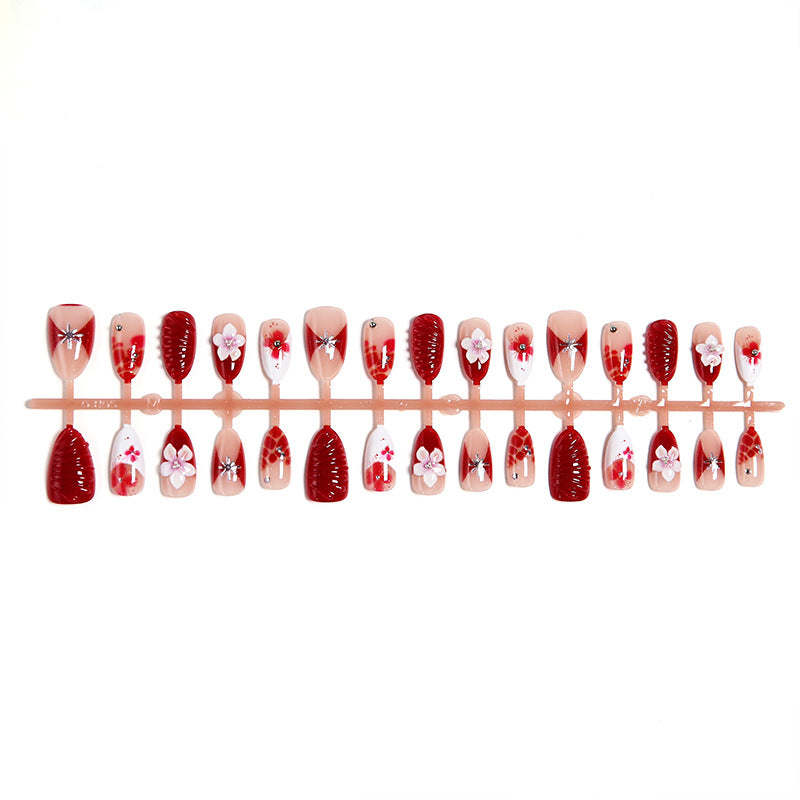 Luxury designed artificial nails with flower accents Acalora