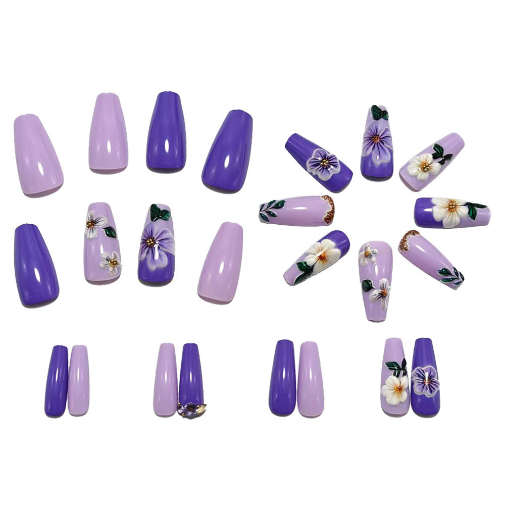 Artificial nails with floral embellishments and elegant high gloss Acalora