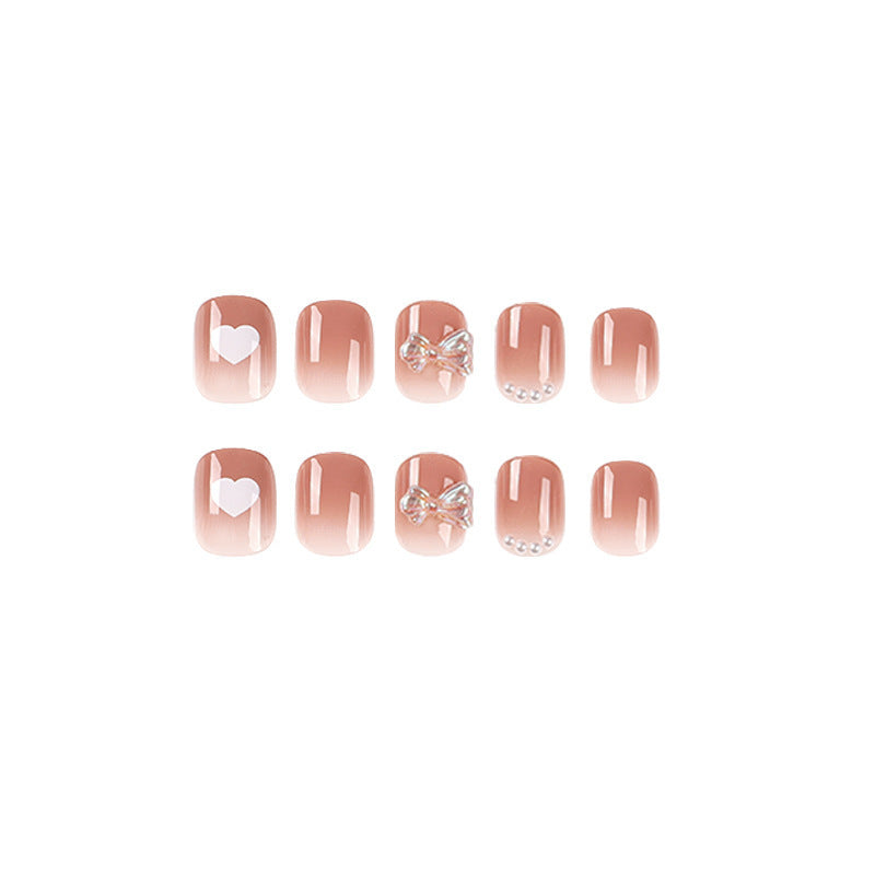 Artificial nails with romantic hearts and glitter accents Acalora