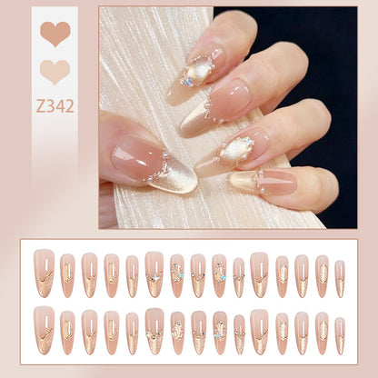 Art nail set with elegant gold glitter design Acalora