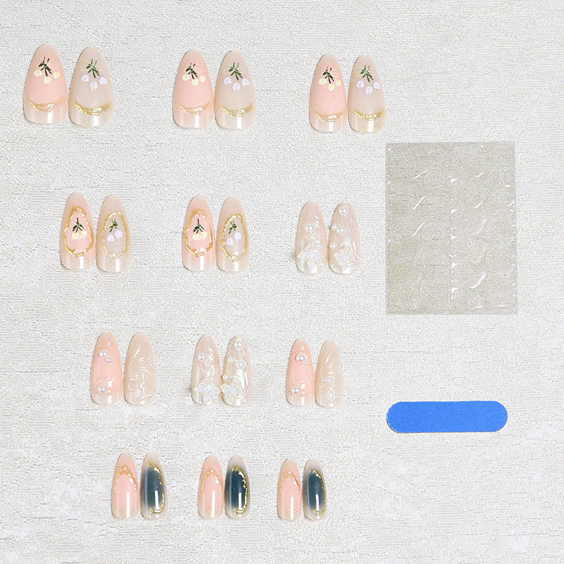 Nail art set with filigree floral decorations Acalora