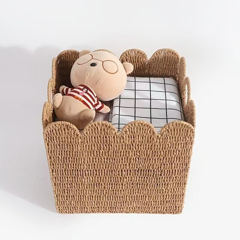 Decorative storage basket made of natural material Acalora