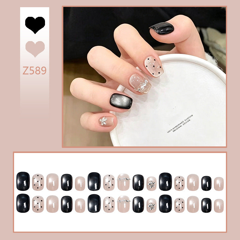 Acrylic nail set with glamorous accents and delicate designs Acalora