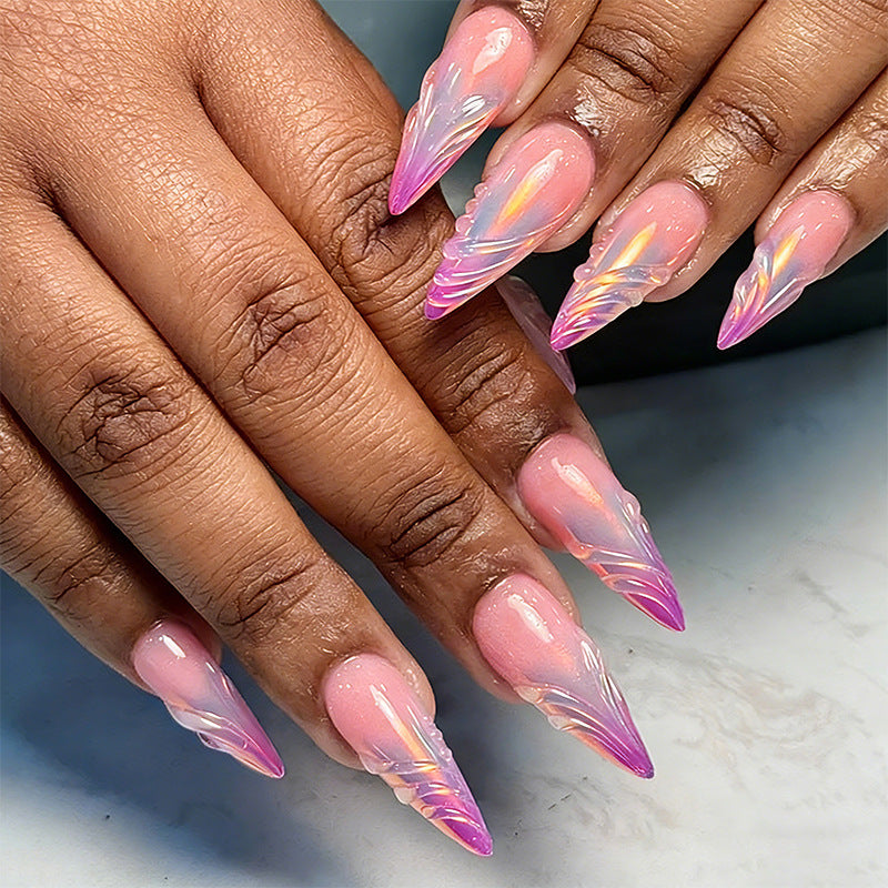 Artificial nails in modern design with pointed accents Acalora