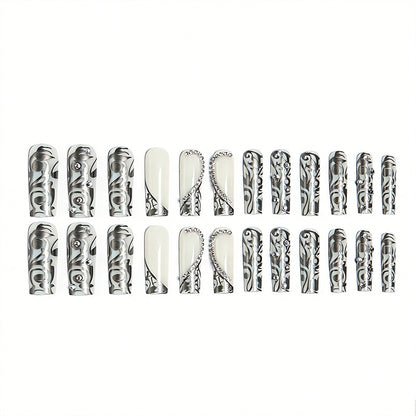 Acrylic nail set with elegant patterns and sparkling accents Acalora
