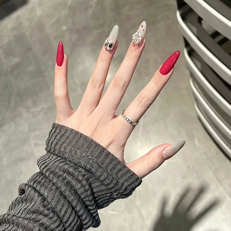 Artificial nail set with sparkling crystal accents and elegant color gradients Acalora