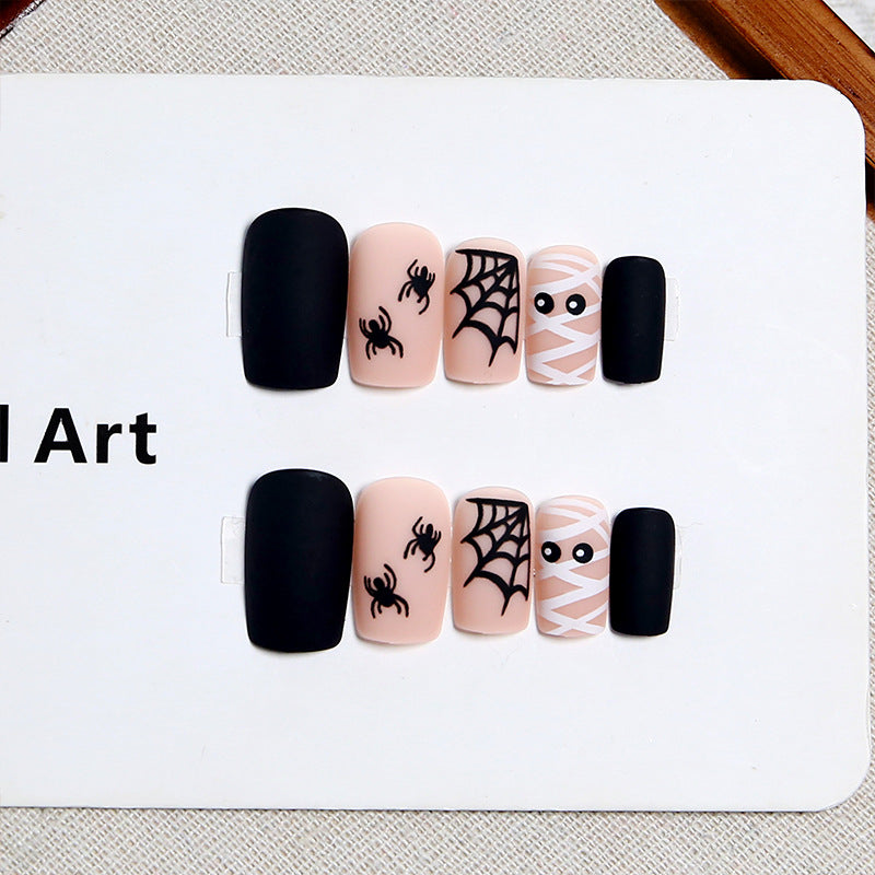 Artificial nail set with creepy Halloween motif and delicate spider designs Acalora