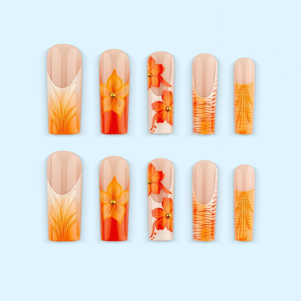 Nail art with floral accents and glitter Acalora