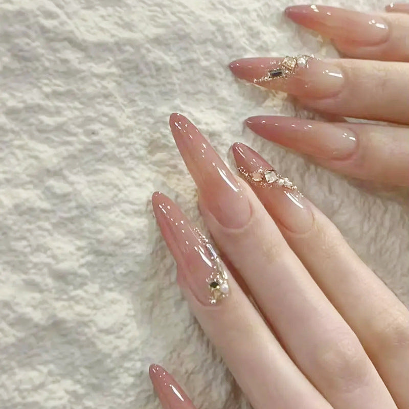 Artificial nail set with elegant ombre effect and glamorous embellishments Acalora