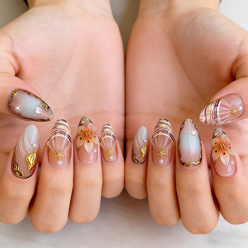 Artificial nail set with delicate flower and glitter decorations Acalora