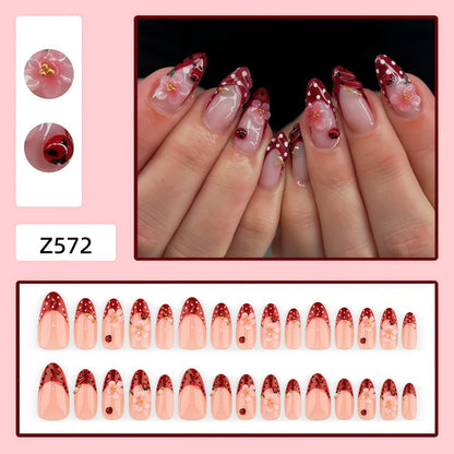 Creative tip design artificial nails with floral accents Acalora