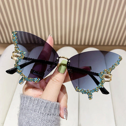 Women's extravagant sunglasses with sparkling butterfly design Kalsten