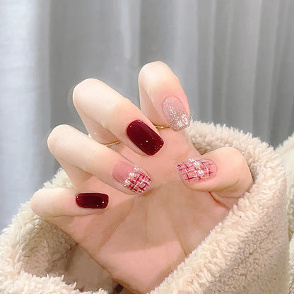 Artificial nail set with glamorous glitter and textural accents Acalora
