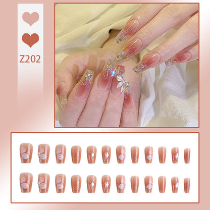 Artificial nail set with floral and glittering accents Acalora