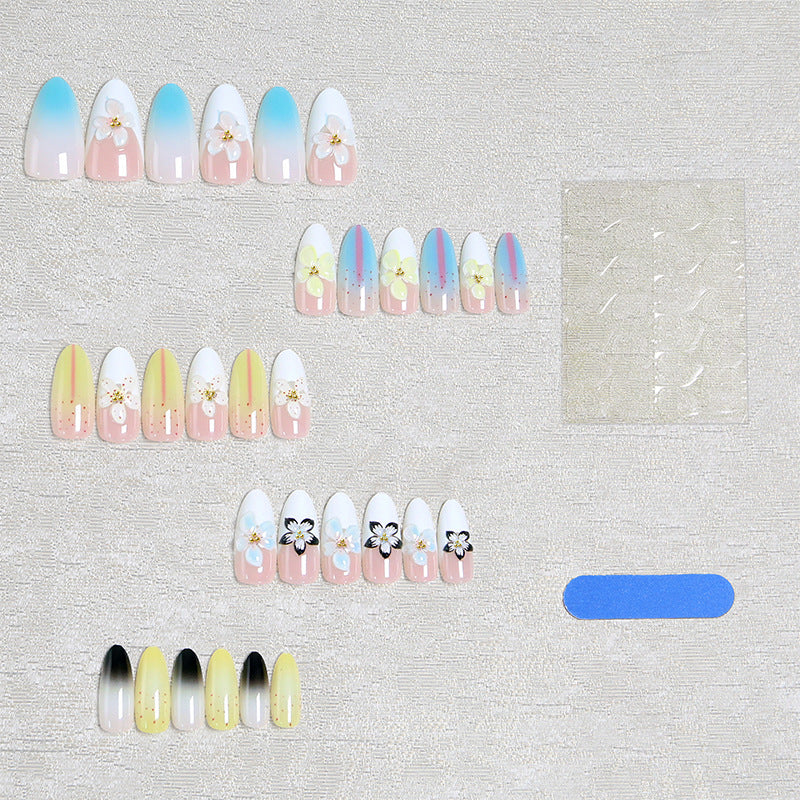 Artificial nail set with floral and glittering decorations Acalora