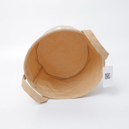 Fun storage basket with dinosaur motif