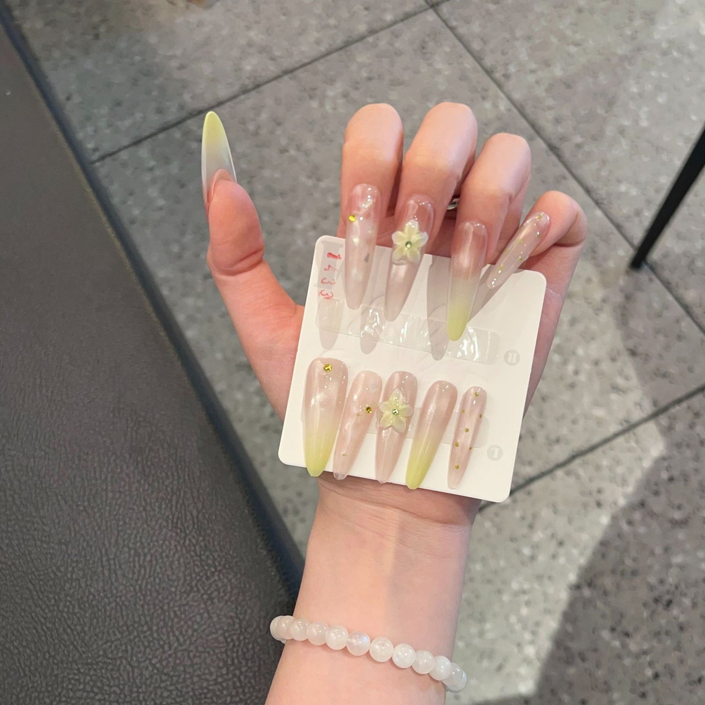 Elegant Long Stiletto Press-On Nail Art Set with Floral Accents Acalora