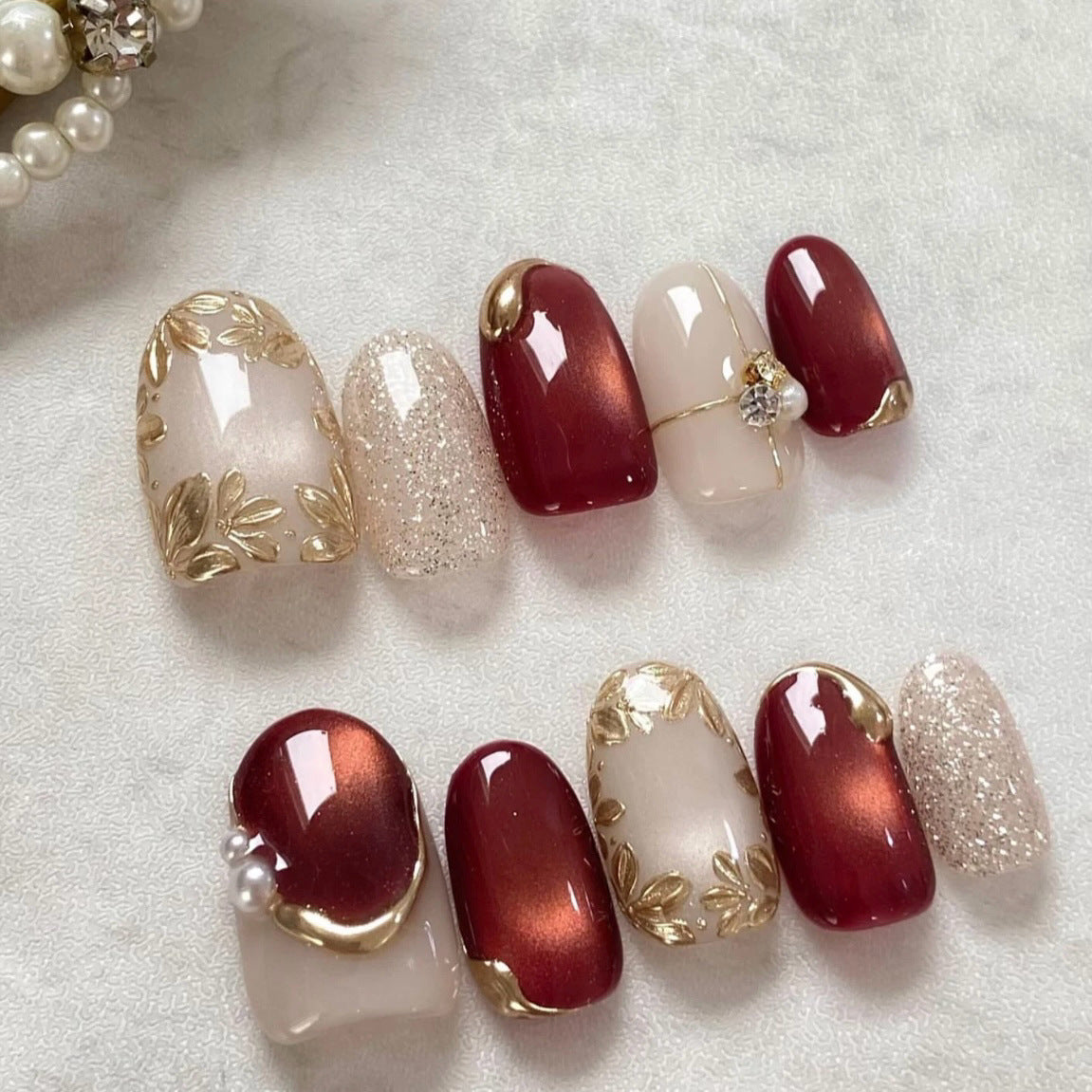 Acrylic nail set with elegant flower and glitter accents Acalora