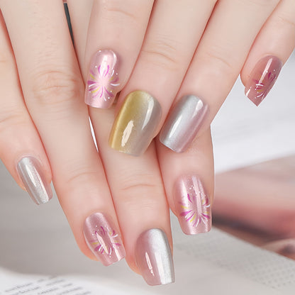 Artificial nails in modern ombre design with floral accents Acalora